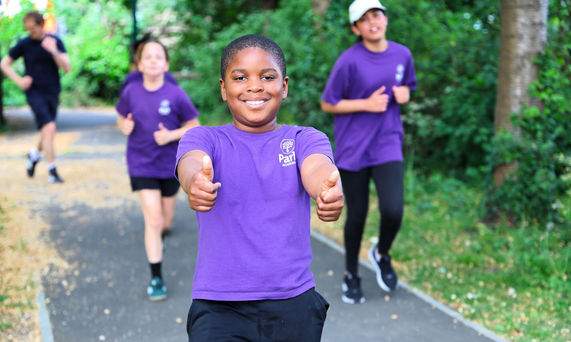 Park Academy pupils playing tennis Image